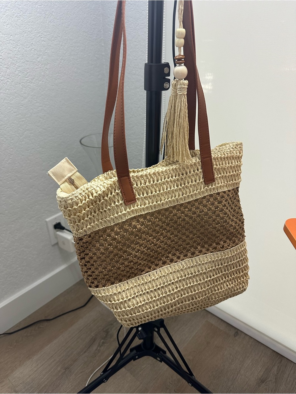 Woven Straw Tote Bag with Brown Trim and Tassel